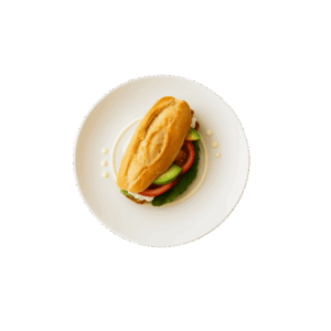Lonche de panela en bolillo con jitomate, lechuga y aguacate.