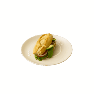 Lonche de pierna en bolillo con jitomate, cebolla, lechuga y aguacate.